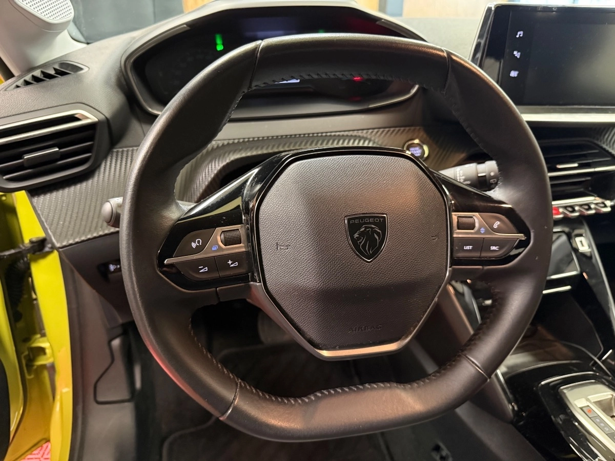 Peugeot E-208 - photo 20