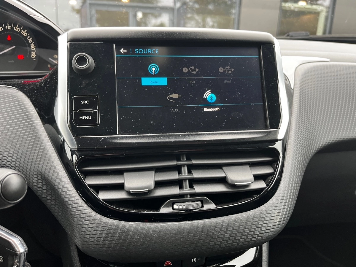 Peugeot 208 - photo 14