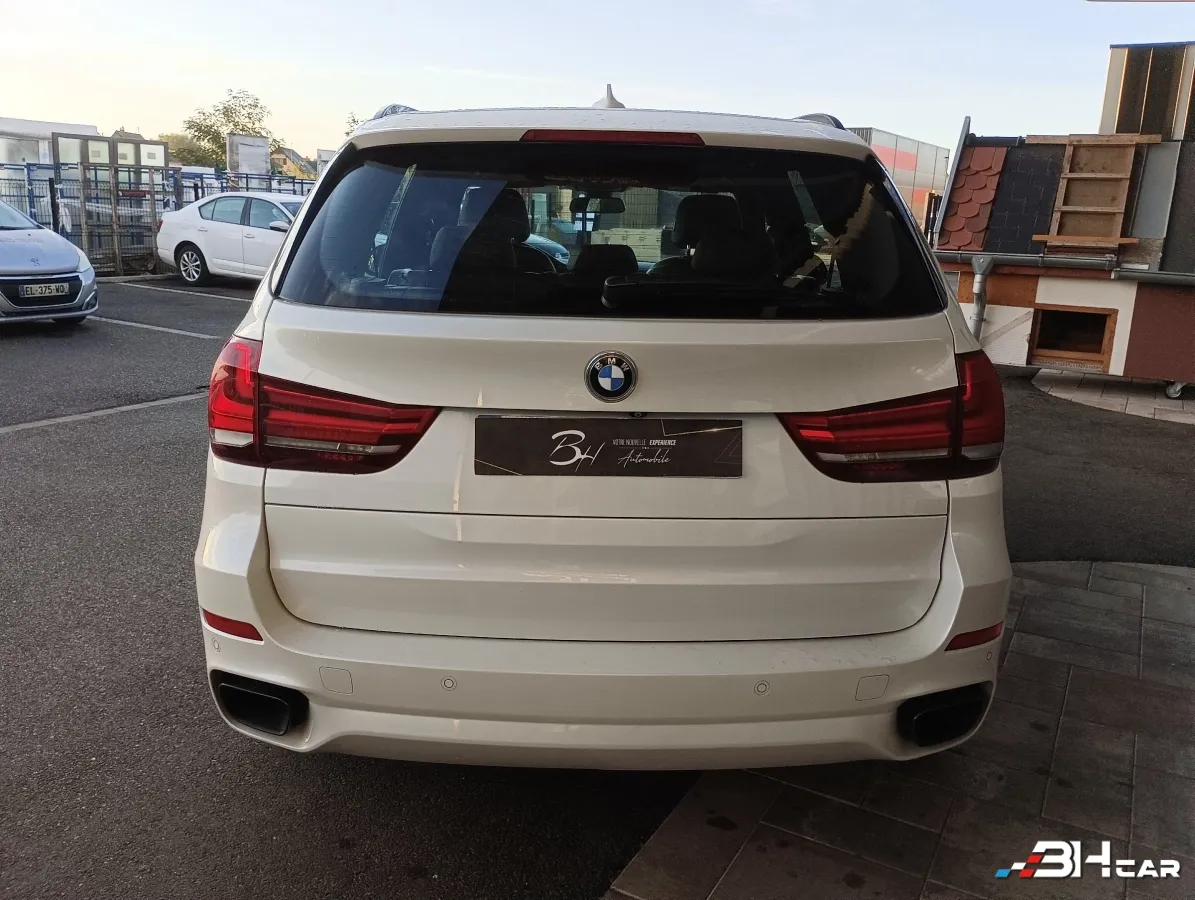 Bmw X5 - photo 4