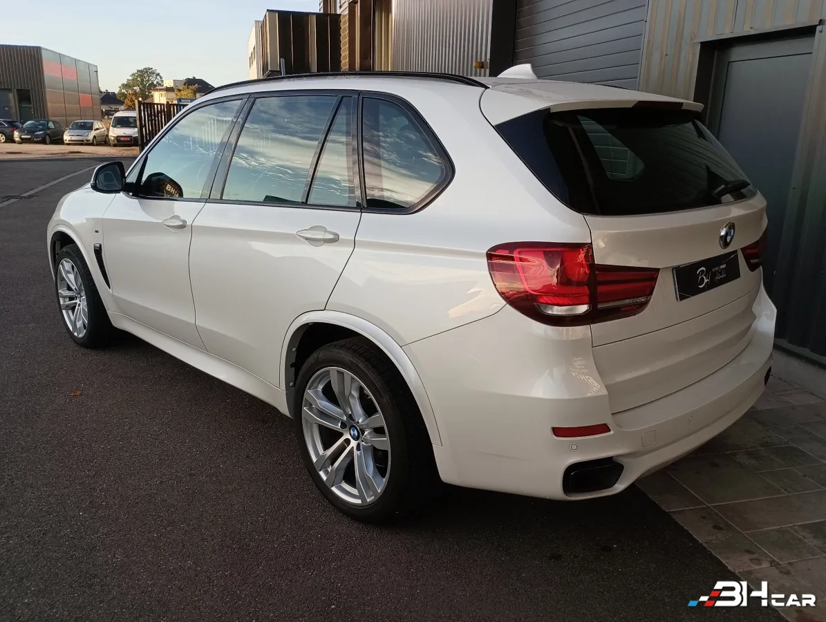 Bmw X5 - photo 3