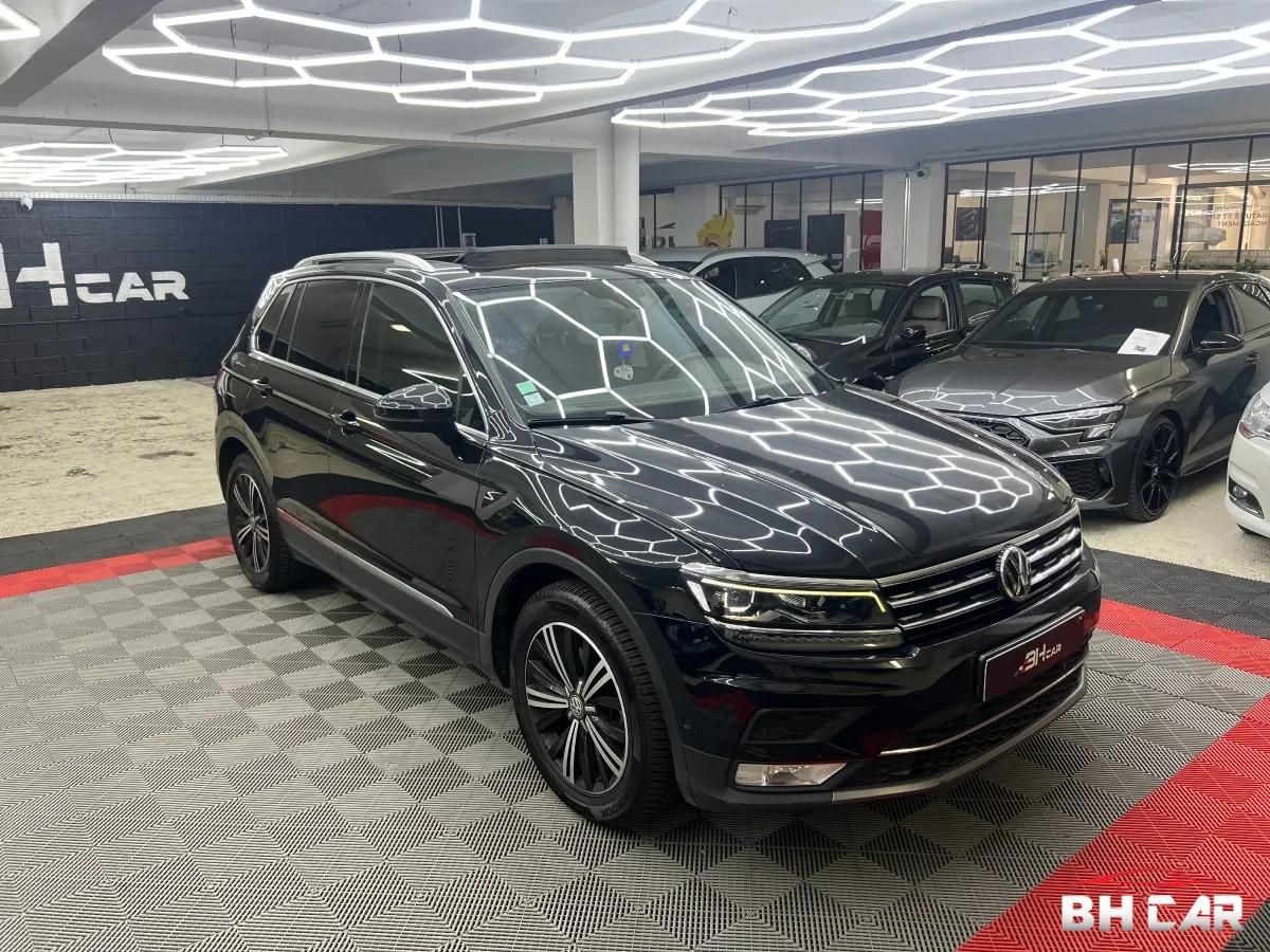 Image: Volkswagen Tiguan II 2.0 TDI 150ch BlueMotion Technology Carat ( TOIT OUVRANT, COCKPIT, CAMERA,...)