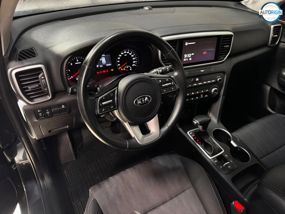 Kia Sportage - photo 11