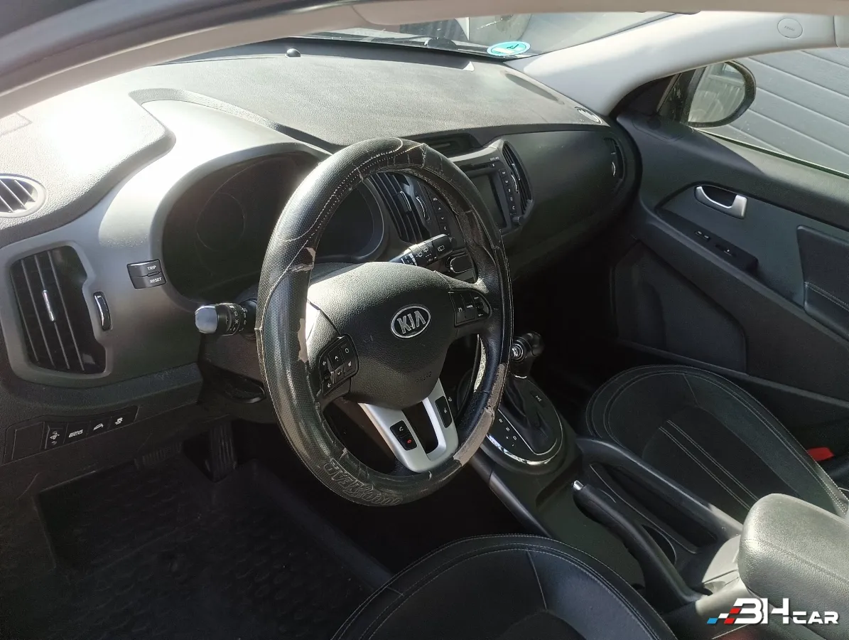 Kia Sportage - photo 14